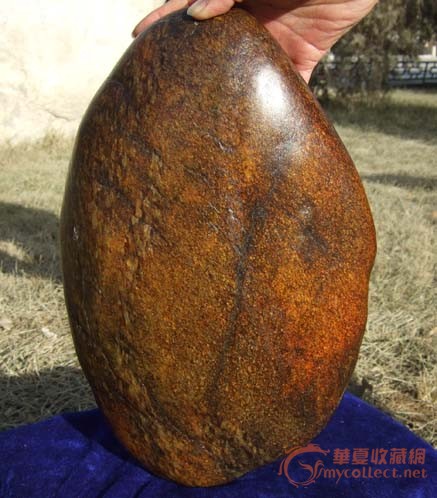 7390克新疆和田枣红皮石包玉籽料